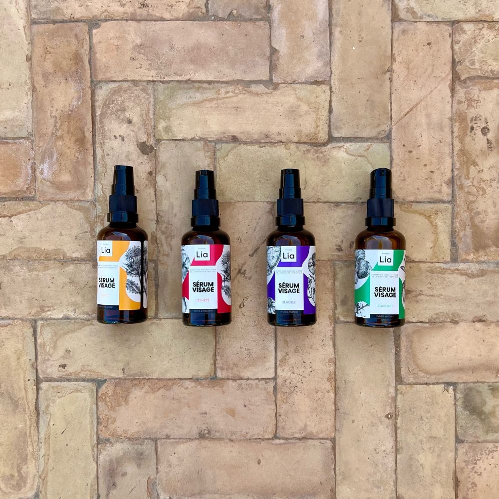 photo des 4 serums princesse lia 50ml sur fond de bejmat marrocain